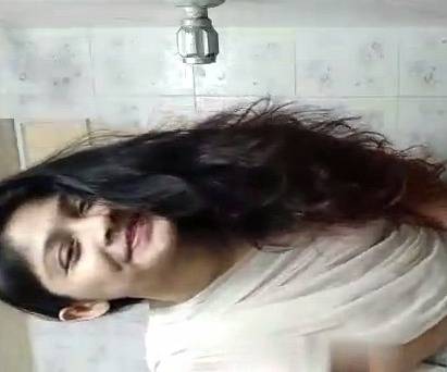 Dhaka Monipuri girl bathing in Saree
