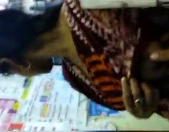 Shop staff lady showing boobs