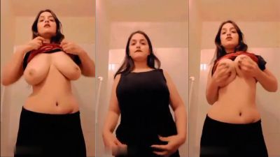 Big-boob nude girl strips and shows her boobs and ass