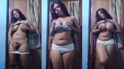 Desi girl strips naked and shows her boobs and hairy pussy